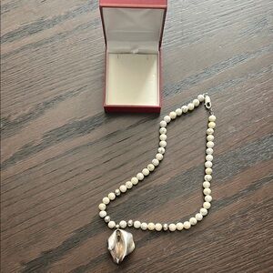 Elegant Silver and Cream Beaded Necklace